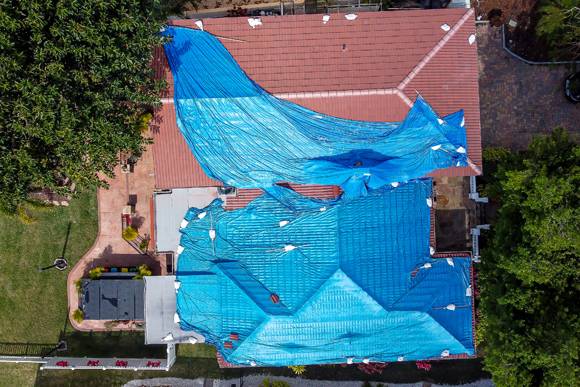 Roof Shrink Wraps in Boca Raton, Boynton Beach, Lake Worth, and Surrounding Areas