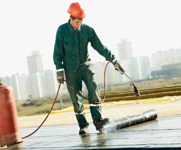 roofing technician providing Commercial Roofing for Boca Raton Businesses