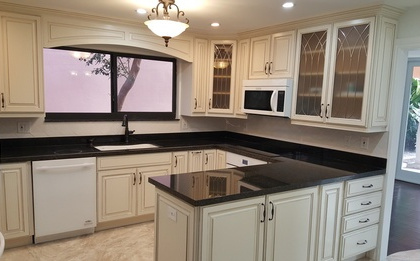 Kitchen remodel in Boynton Beach with dark countertops