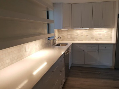 Kitchen renovation with lighting under cabinetry