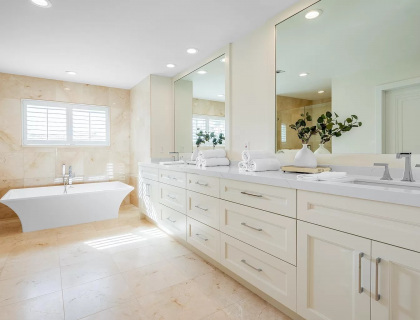 Bath remodel showing double sinks and tub