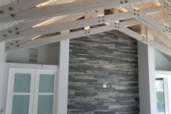 Home improvement contractors installed custom beams in ceiling