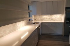 Kitchen renovation with lighting under cabinetry