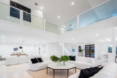 Home remodeling in Boynton Beach, living room with second story walk way