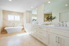 Bath remodel showing double sinks and tub